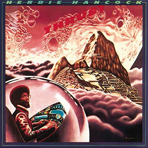 Herbie Hancock’s “Thrust” album cover: mountains, clouds, and a portrait.