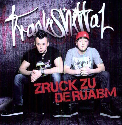 CD cover featuring two young men squatting against a textured wall.