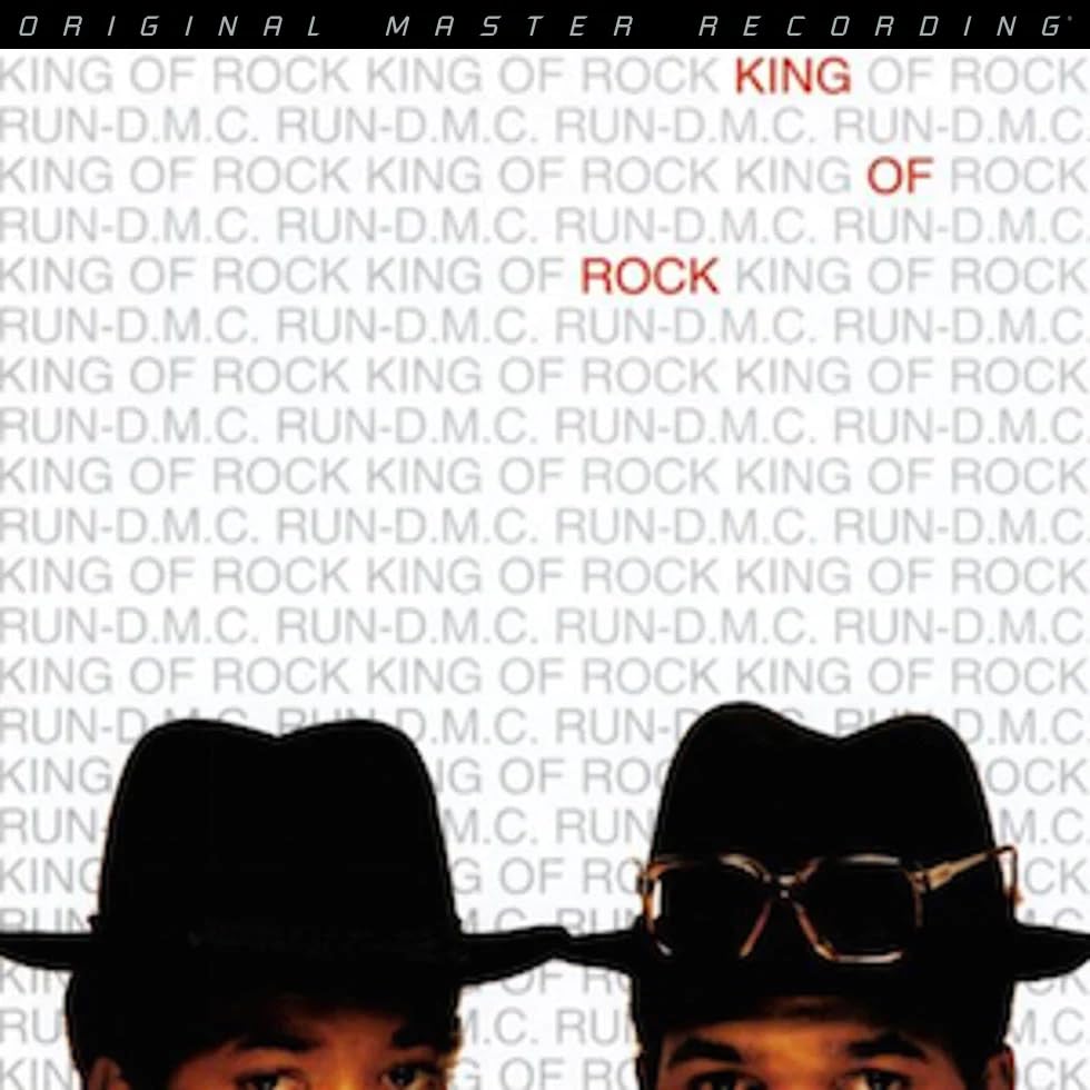 Run-DMC album cover featuring the group in black hats and sunglasses.