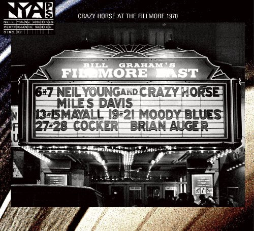 Fillmore East marquee displaying Neil Young and Crazy Horse concert dates.