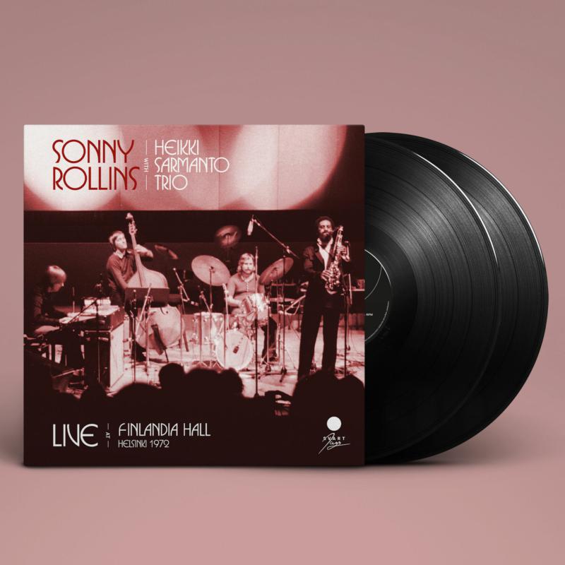 Sonny Rollins album cover with musicians and a black vinyl record.