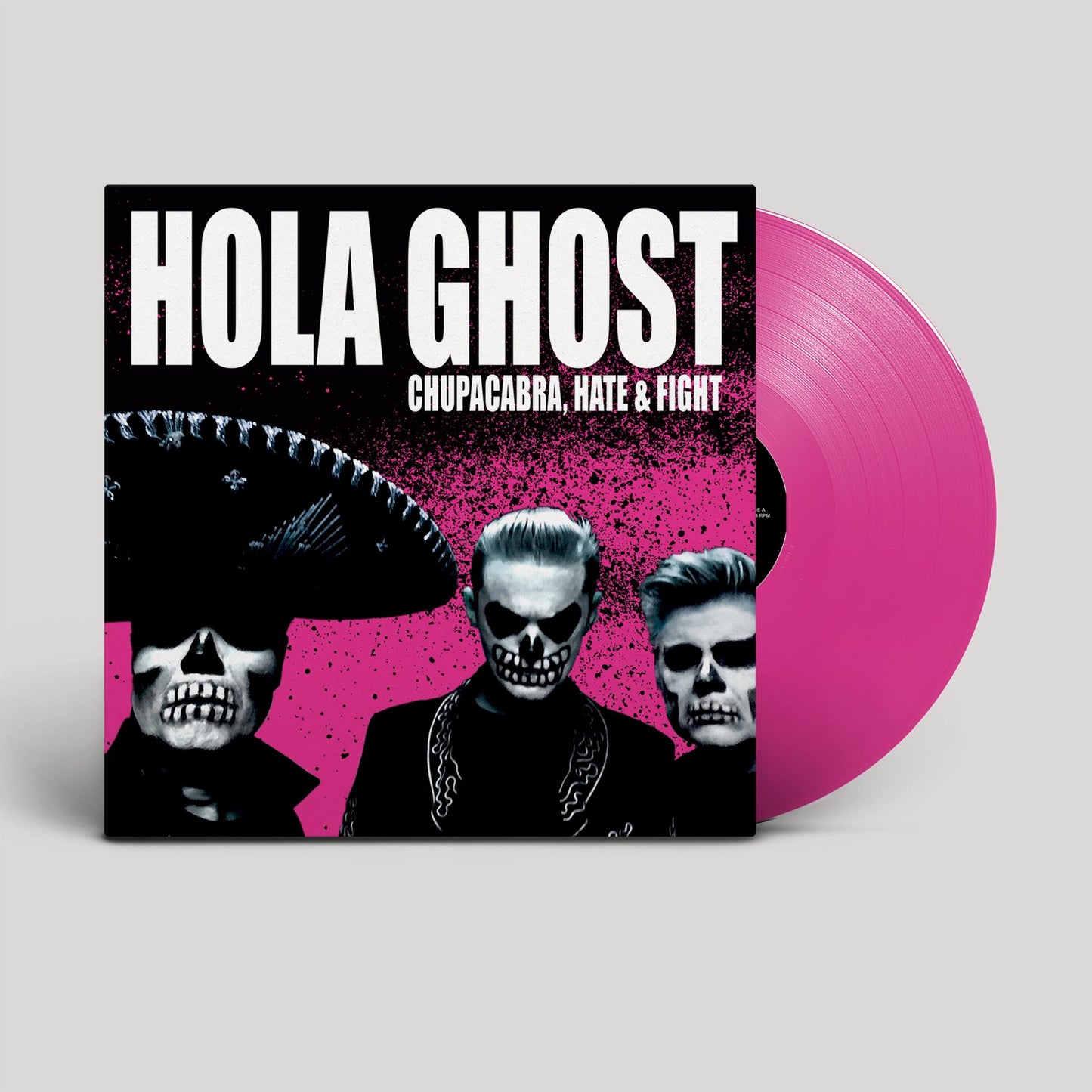 Vinyl record with album art featuring skull-faced figures in sombreros.