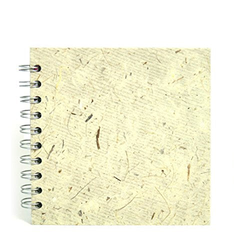 Spiral-bound notebook with textured, cream-colored banana paper pages.