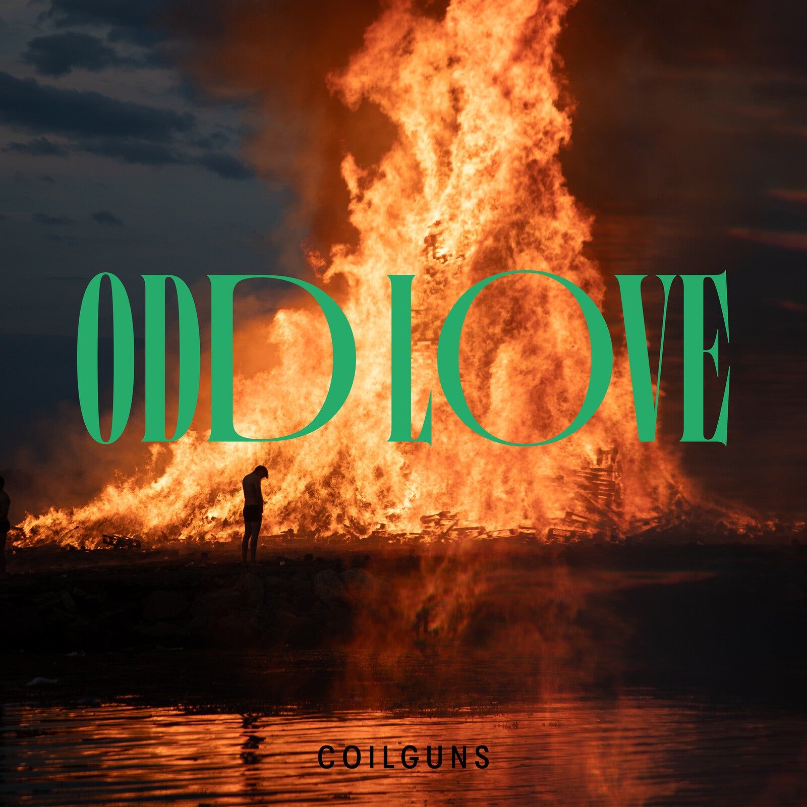 Vinyl album cover: burning bonfire with a lone figure, teal text.