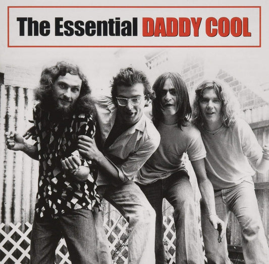 Black and white photo of the band Daddy Cool standing together outdoors.
