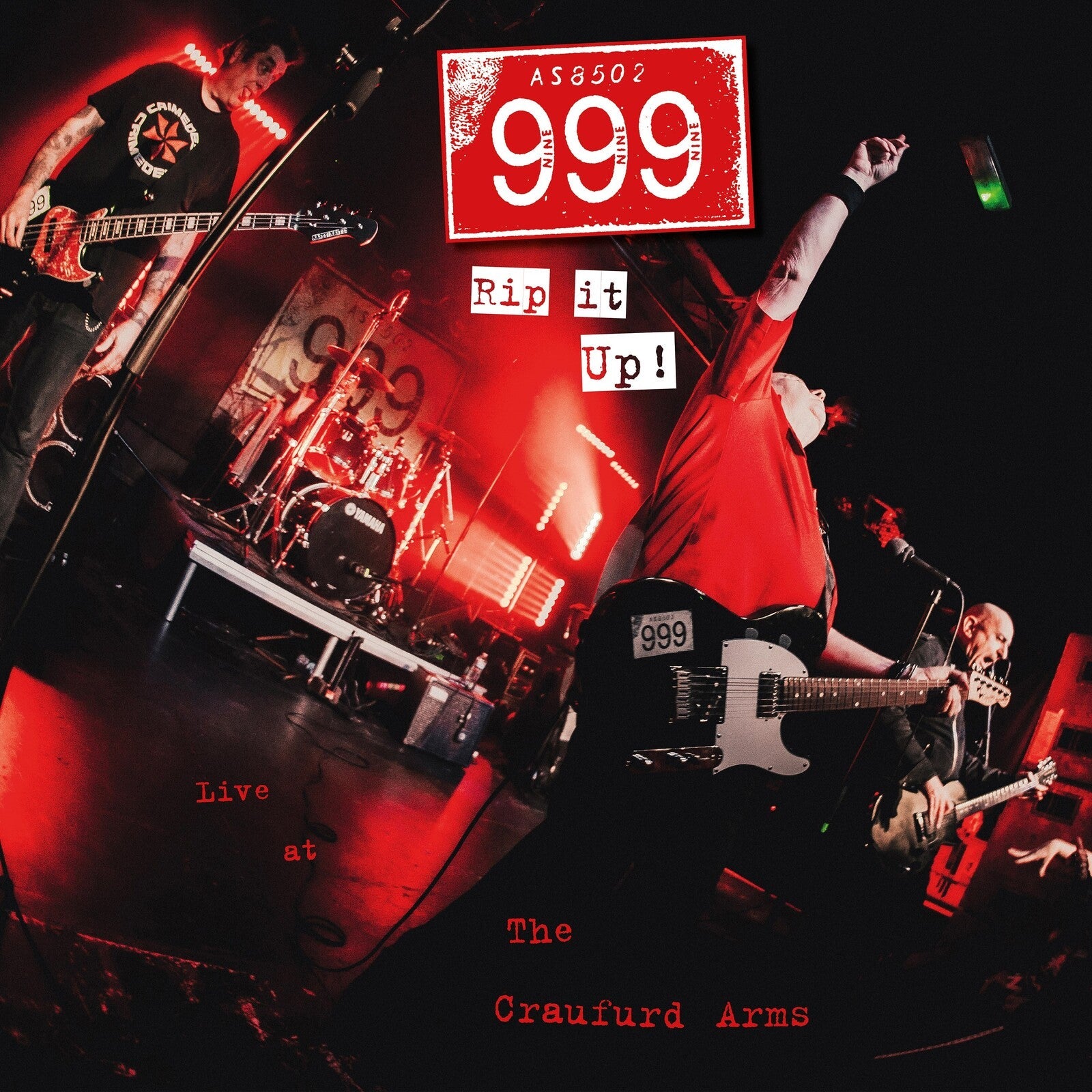 Punk band 999 performing live on stage, red and black color scheme.