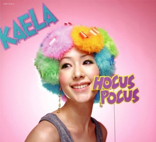 DVD cover featuring a smiling woman with a colorful, fluffy hat.
