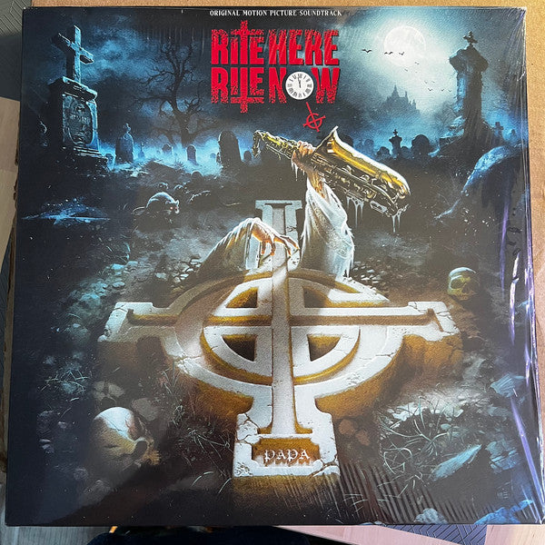 Ghost's "Rite Here Rite Now" vinyl album cover with graveyard imagery.