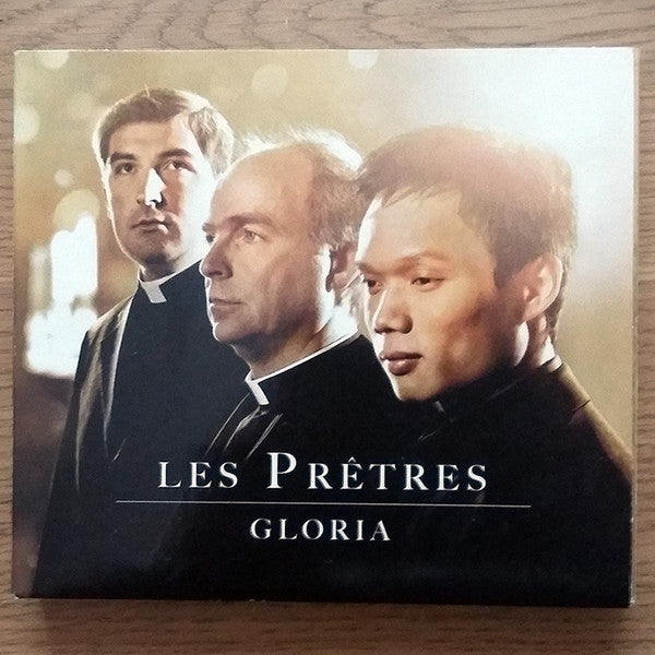 DVD cover featuring three men in clerical collars, titled “Gloria.”