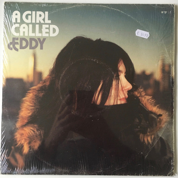 Vinyl record cover featuring a woman in a fur-trimmed coat.