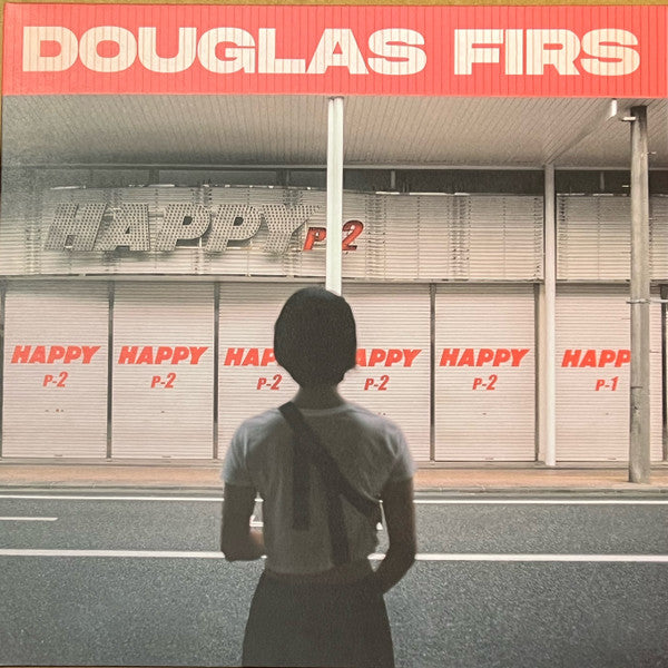Vinyl record cover: person viewed from behind, building facade, text "HAPPY P-2".