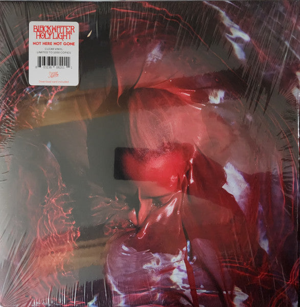 Shrink-wrapped vinyl record with abstract red and dark imagery and a product information sticker.