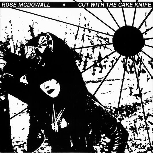 Black and white album cover featuring a hooded figure and radial lines.