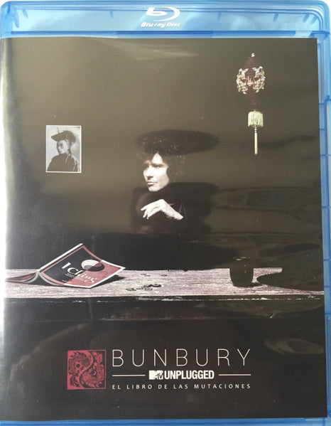 Blu-ray case for "El Sur" featuring a man and chandelier illustration.