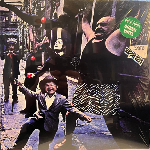 The Doors’ “Strange Days” album cover, featuring figures in a street scene.