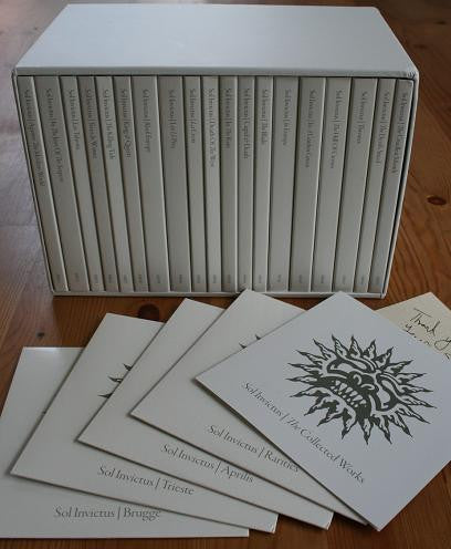 Stack of "Silent Hill" DVDs in a box with accompanying white cards.