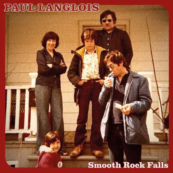 CD cover: Group portrait in front of a house, 1970s style.