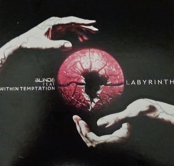 CD cover: red, cracked sphere held by ghostly hands, dark background.