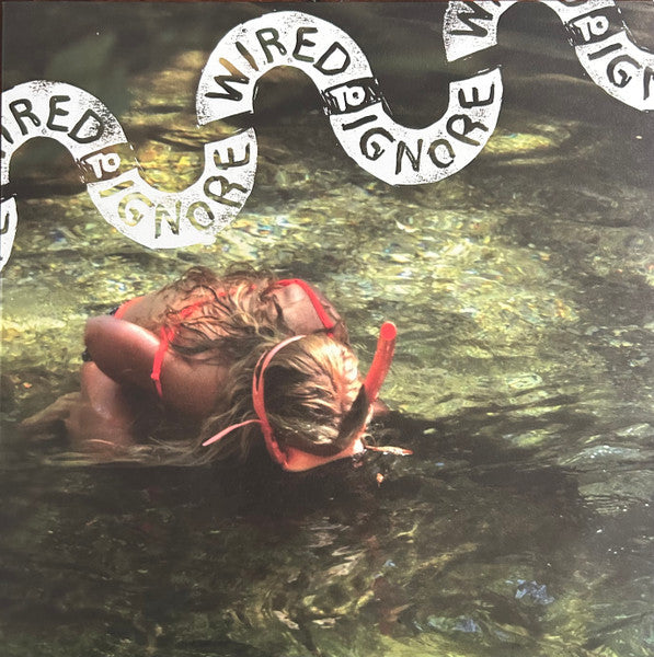 Vinyl record cover with a swimmer in shallow, rippled water.