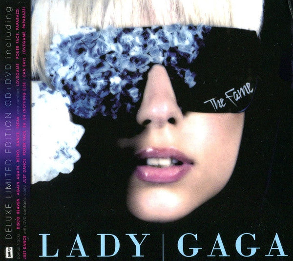Lady Gaga album cover, “The Fame”, with textured headwear and text.