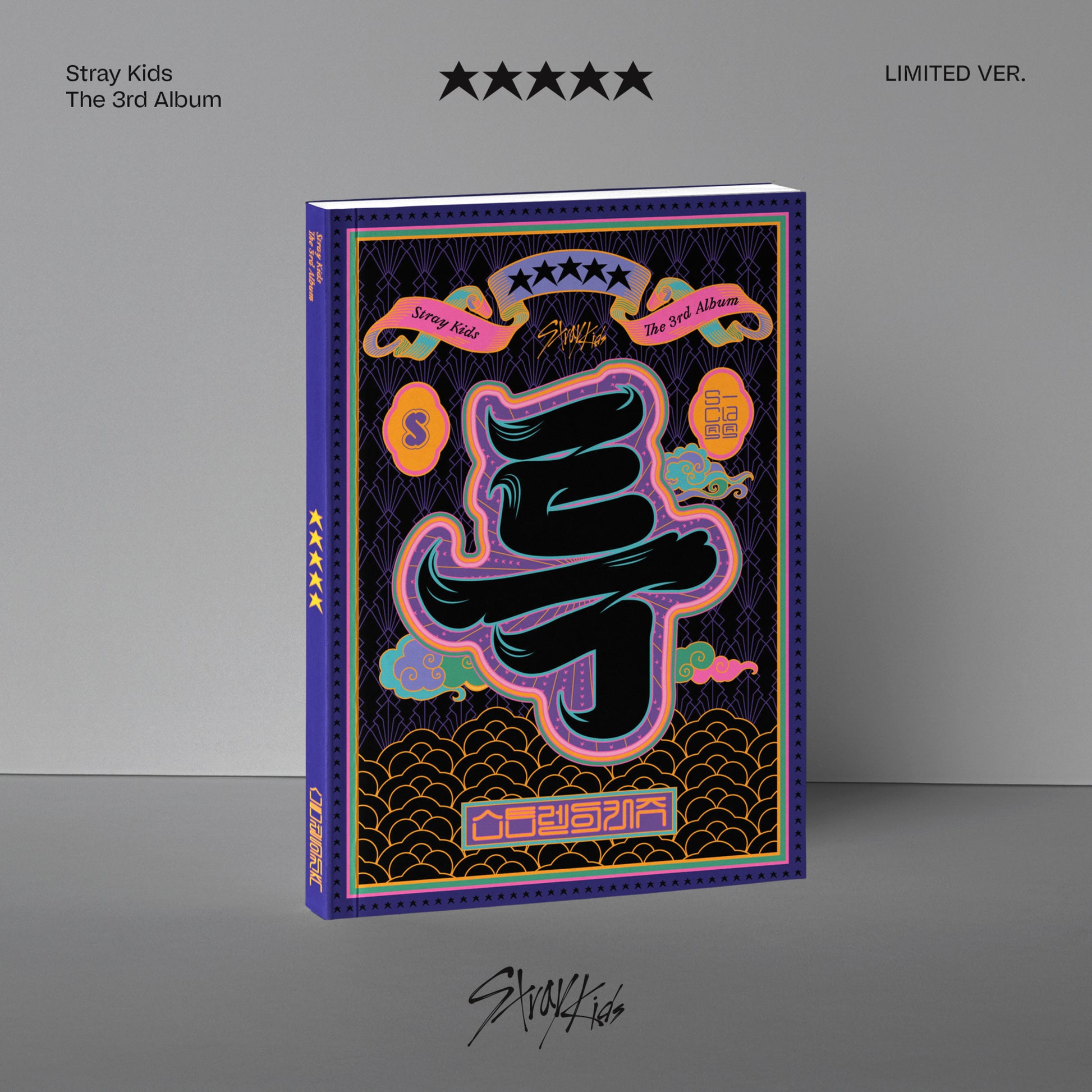 "Black book with a white question mark on the cover, gray background."