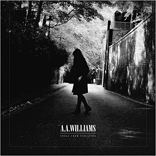 Black and white album cover featuring a lone figure walking down a path.