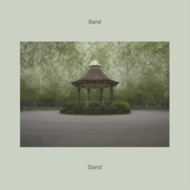 Vinyl album cover featuring a bandstand in a green park.