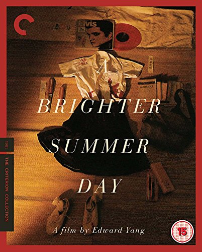 Blu-ray cover featuring a shirt, skirt, and personal items arranged on a wooden floor.