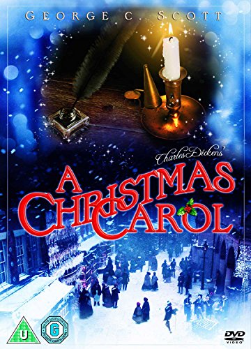 DVD cover for A Christmas Carol featuring a candle, quill, and snowy Victorian street scene.