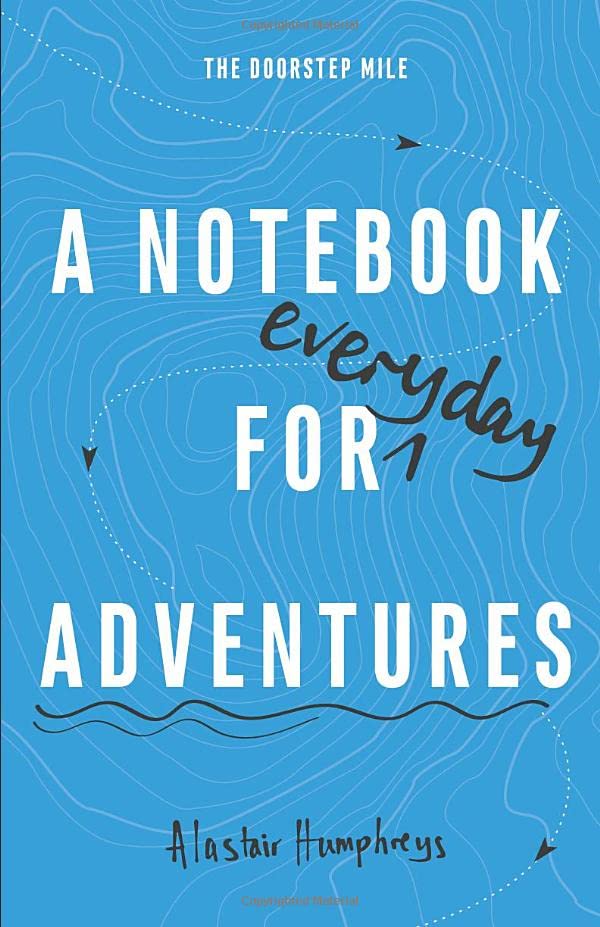 Blue notebook cover with white text: "A Notebook for everyday Adventures" and author name.