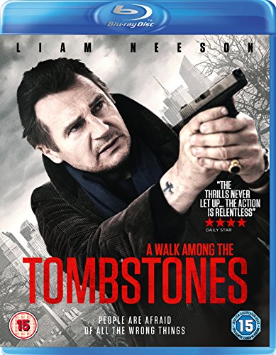 Liam Neeson holding a handgun on the A Walk Among The Tombstones Blu-ray cover.