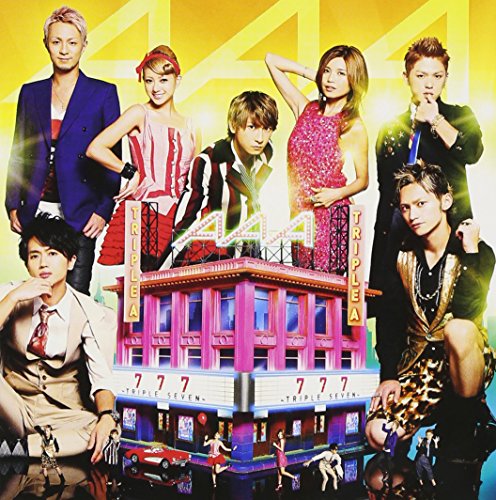 CD cover for “Triple Seven” featuring six people and a pink building.