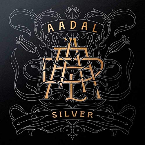 “Aadal Silver” vinyl record cover with ornate, silver-toned floral design.