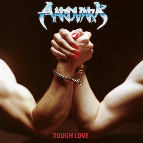 Album cover: hands clasped in handcuffs, red nails, dark background.