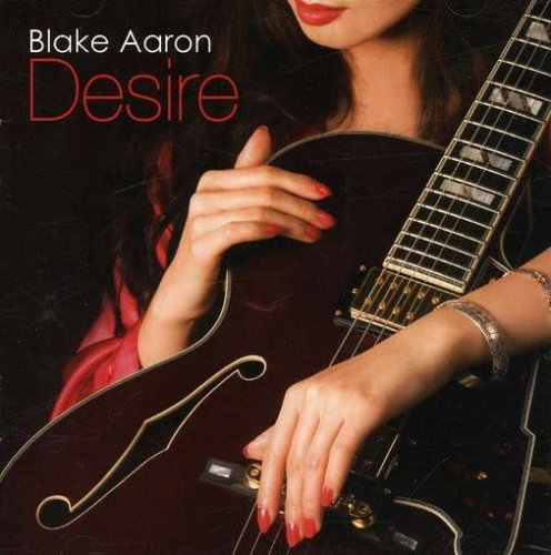 CD cover for Blake Aaron’s “Desire” featuring a woman with a guitar.