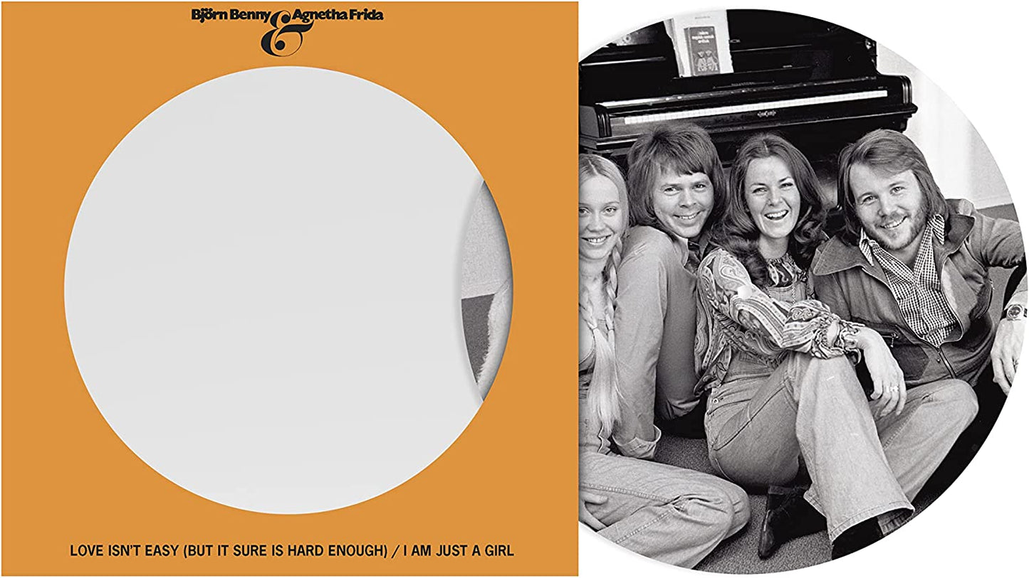 ABBA album cover featuring the group seated near a piano.
