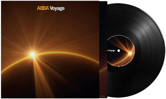 ABBA Voyage vinyl record album cover and black vinyl disc on white background.