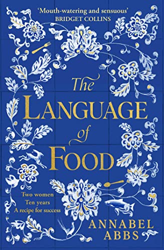 Book cover with blue tile background, white floral patterns, and gold text.