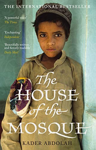 Book cover featuring a young boy in a skullcap against a blue wall.