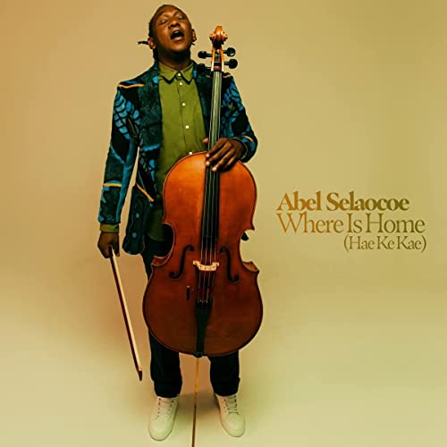Abel Selaocoe stands with a cello, album title text visible.