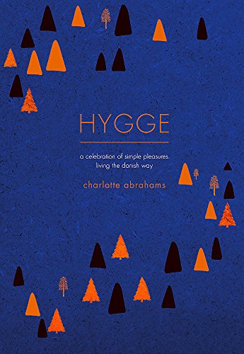 Book cover with blue background, stylized trees, and the word "HYGGE".