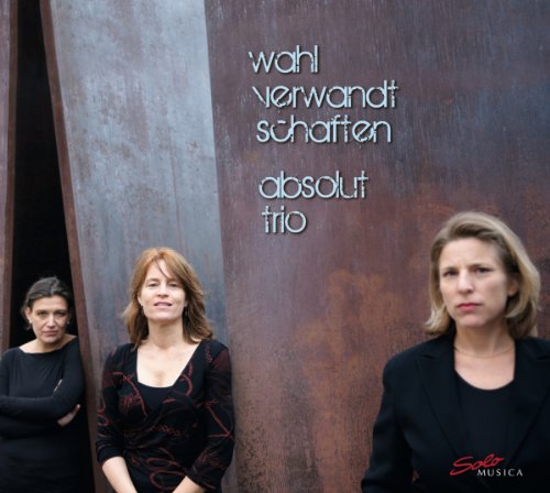 CD cover featuring three women standing against a weathered brown metal wall.