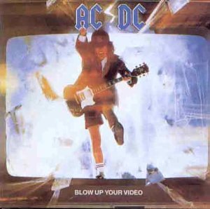 AC/DC album cover featuring a guitarist jumping from a television screen.