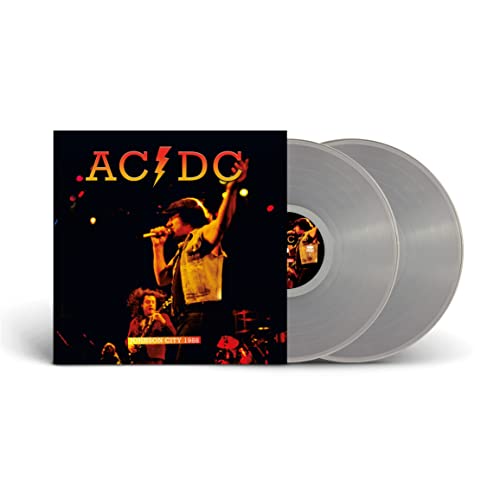 AC/DC album cover and two clear vinyl records shown against a white background.