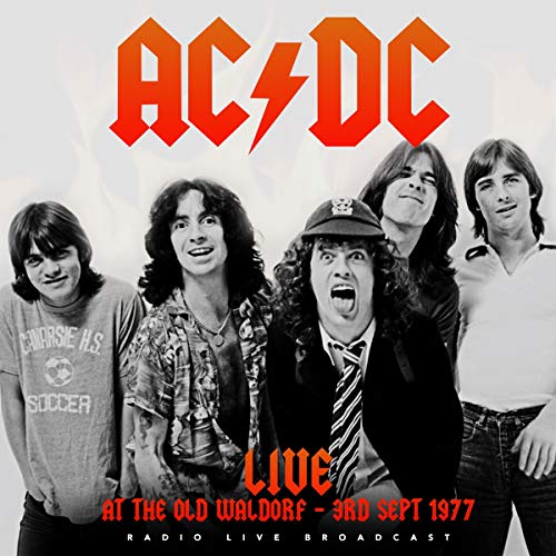 AC/DC band portrait from 1977 album cover, featuring four musicians.