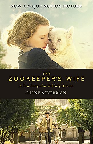 Woman holding a young lion, book cover for "The Zookeeper's Wife".