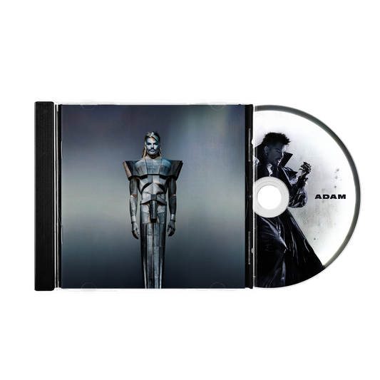 Adam Lambert CD case featuring a futuristic armored figure and a disc with Adam.
