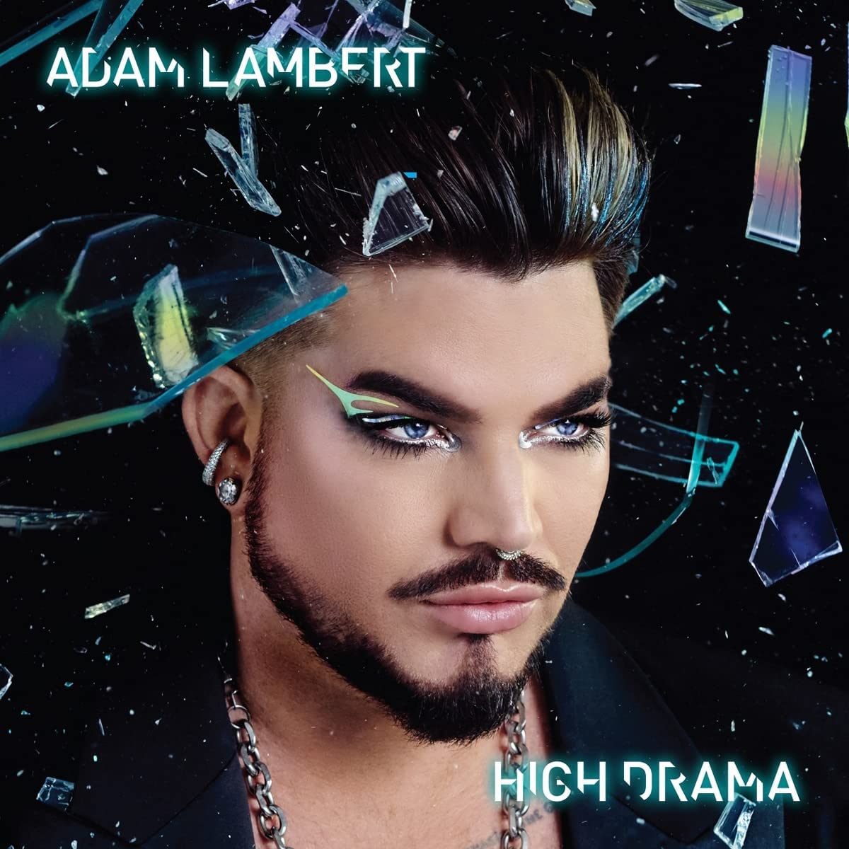"Album cover featuring Adam Lambert with bold makeup and shattered glass around him."