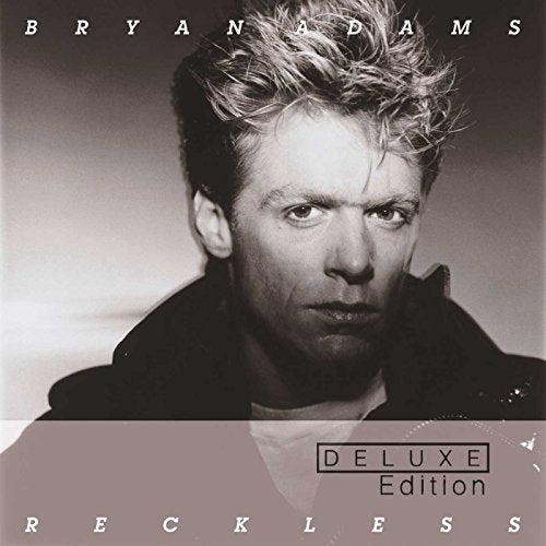 Black and white portrait of Bryan Adams for the “Reckless” CD.