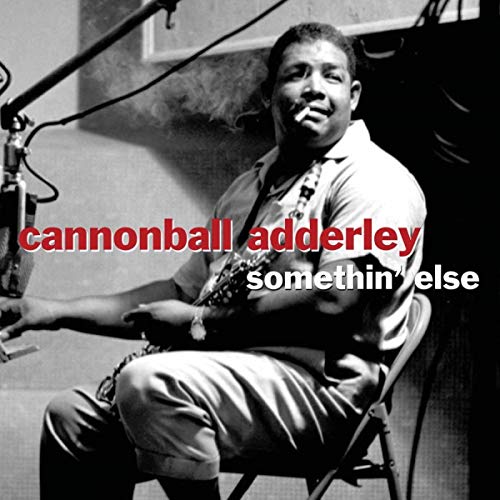 Black and white album cover featuring Cannonball Adderley with saxophone.